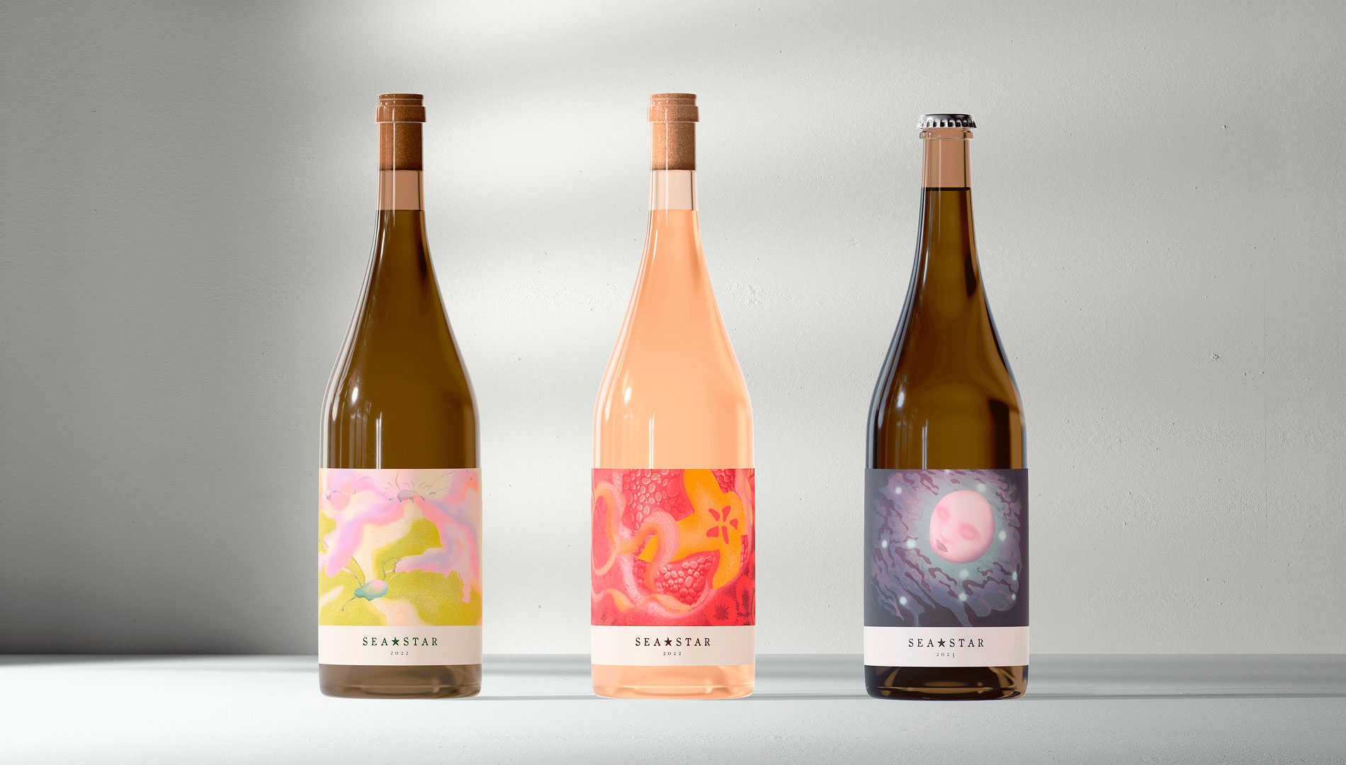 image of three wines on a neutral backdrop with illustrated labels