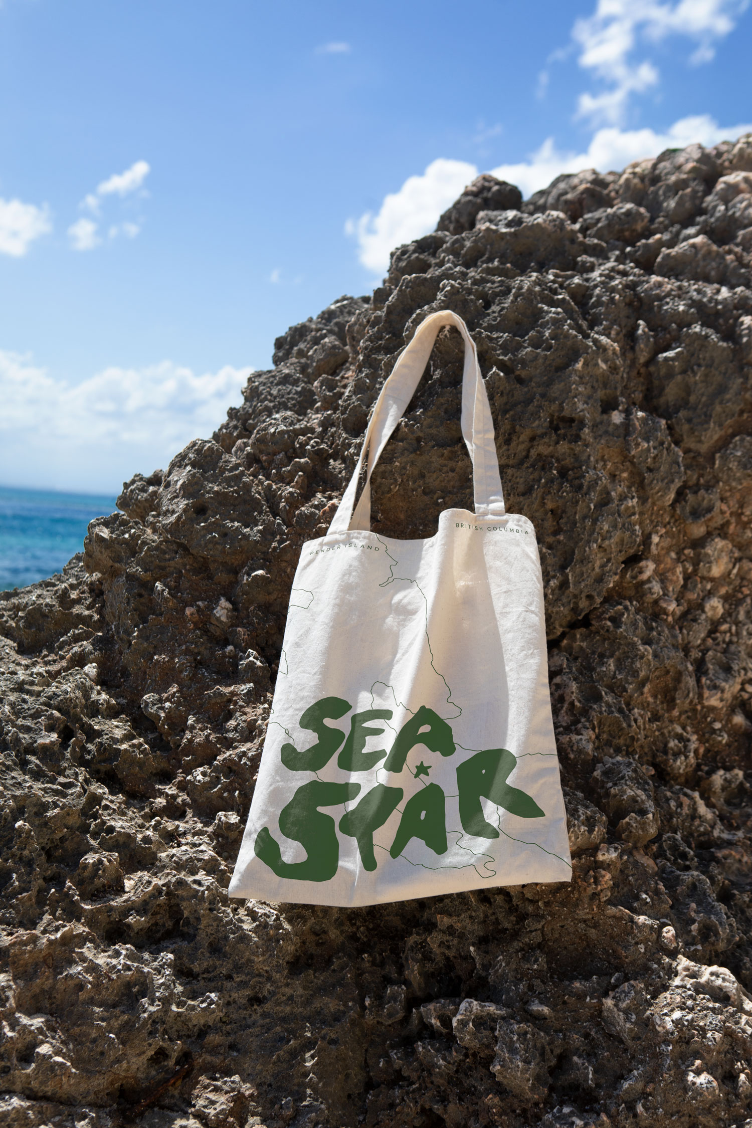 Sea Star Vineyard branded totebag mockup in an ocean environment
