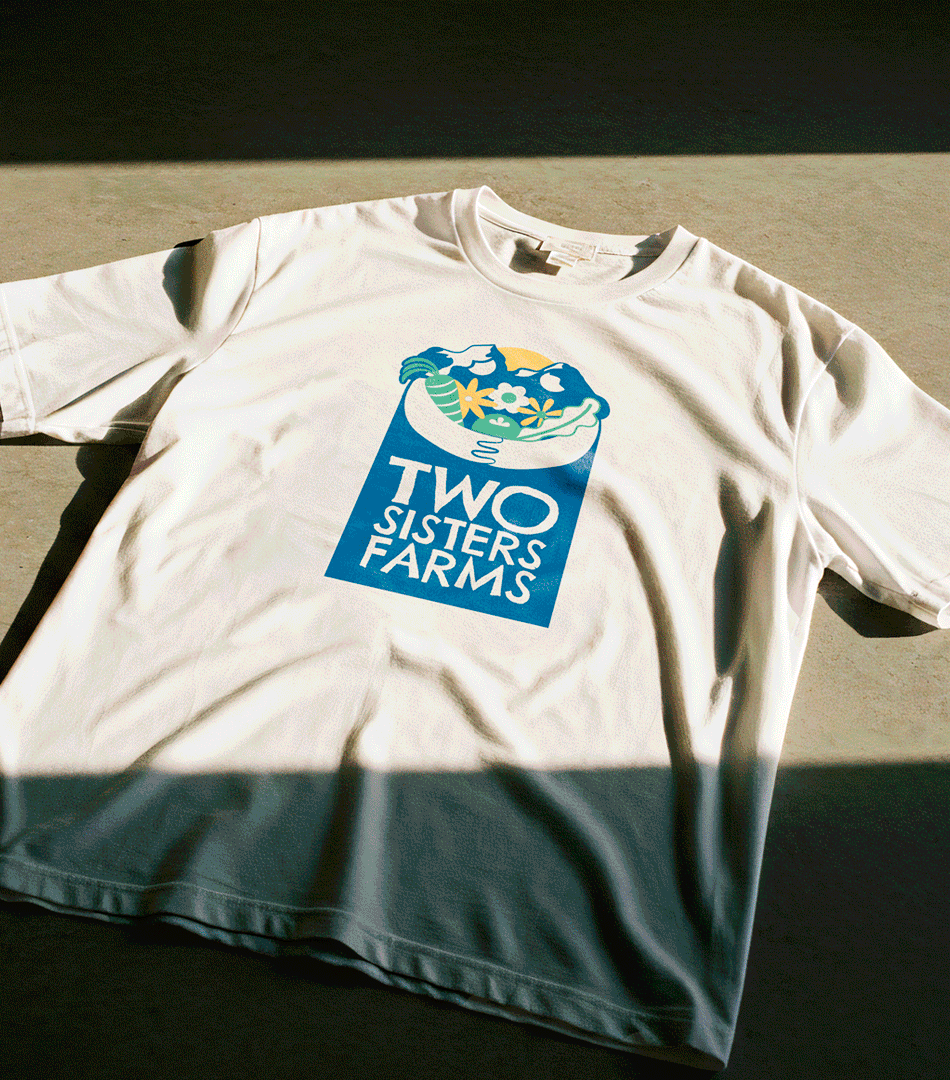 Two Sisters Farms logo on t-shirt and dried flowers