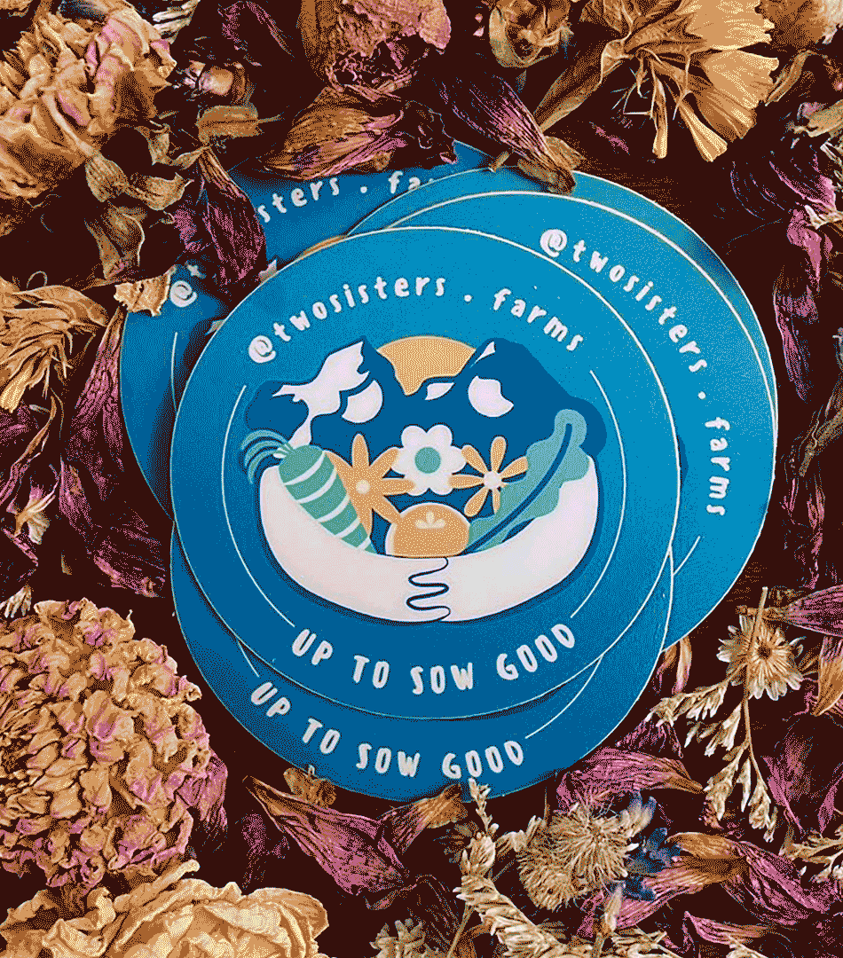 Two Sisters Farms logo on t-shirt and dried flowers